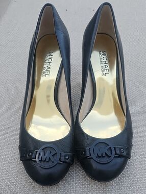 Michael Kors Black Leather Pumps with MK Medallion